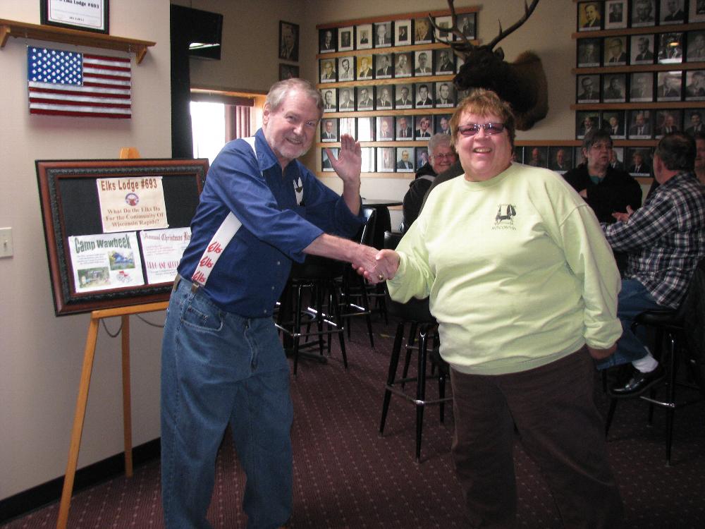 Paul Weimer greets a Lenten Fish Fry diner.