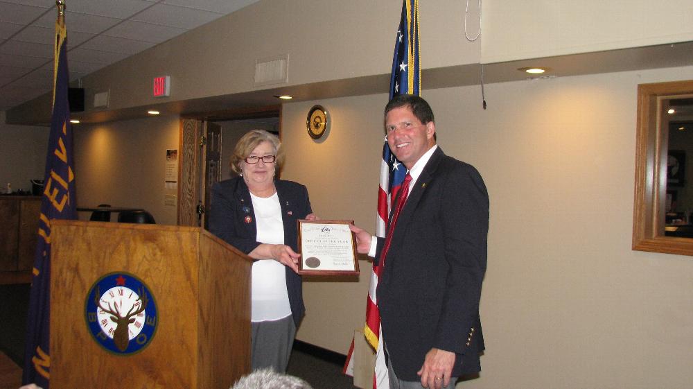 ER Marilyn Gillies presents Officer of the Year Award to Mike Spranger