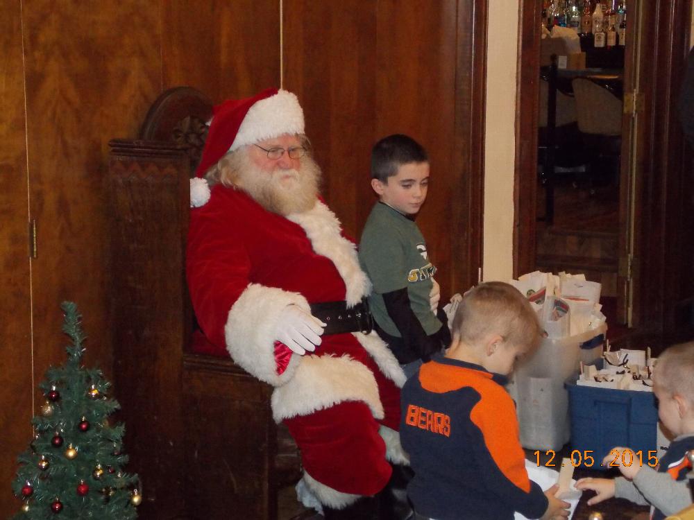 Lunch with Santa kids telling Santa what they want for Christmas!