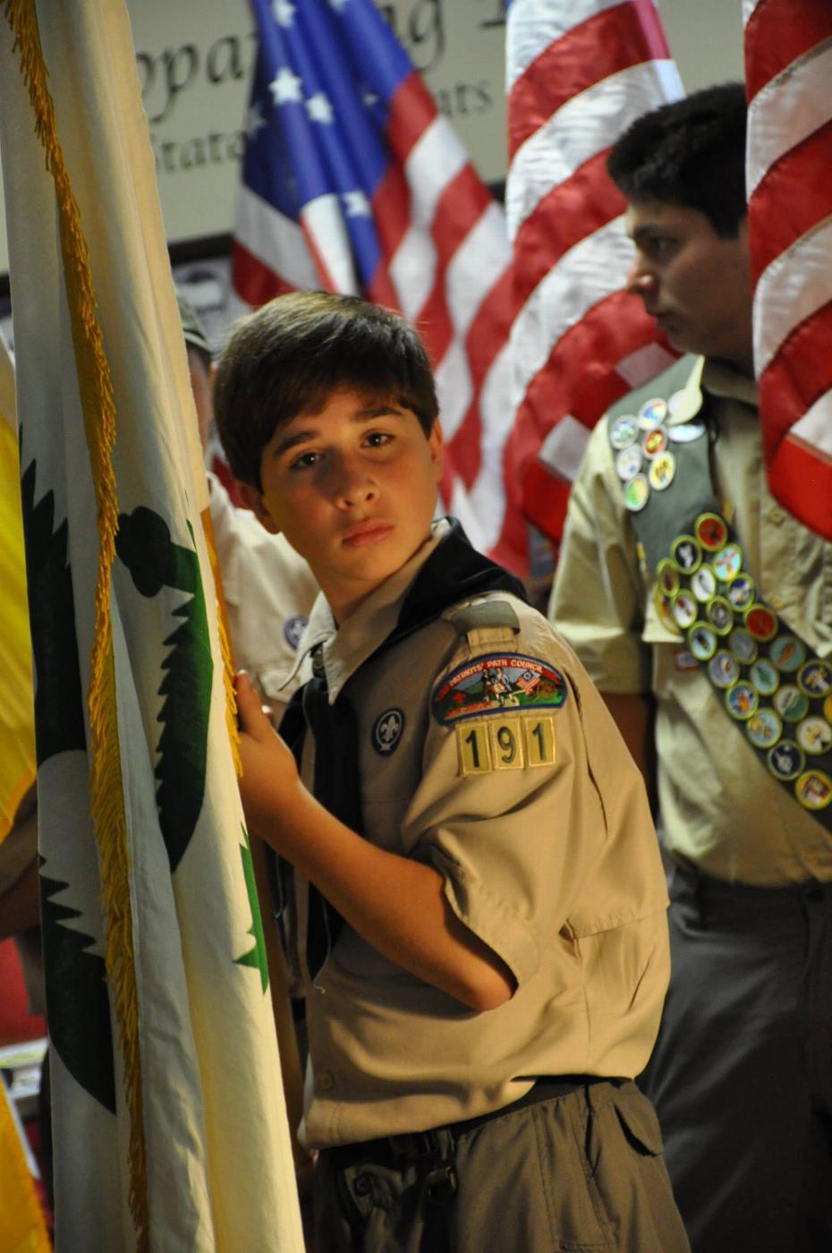 A Boy Scout from Troop 191 assisting the lodge Officers with the Flag Day Ceremony - 2016