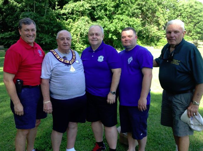 PDD Joe Pennino is presented with his Official jewels by Bob Ricker, PSP; Rick Gathen, PSP; DD Tom Brown and Gerry Cook, PSP