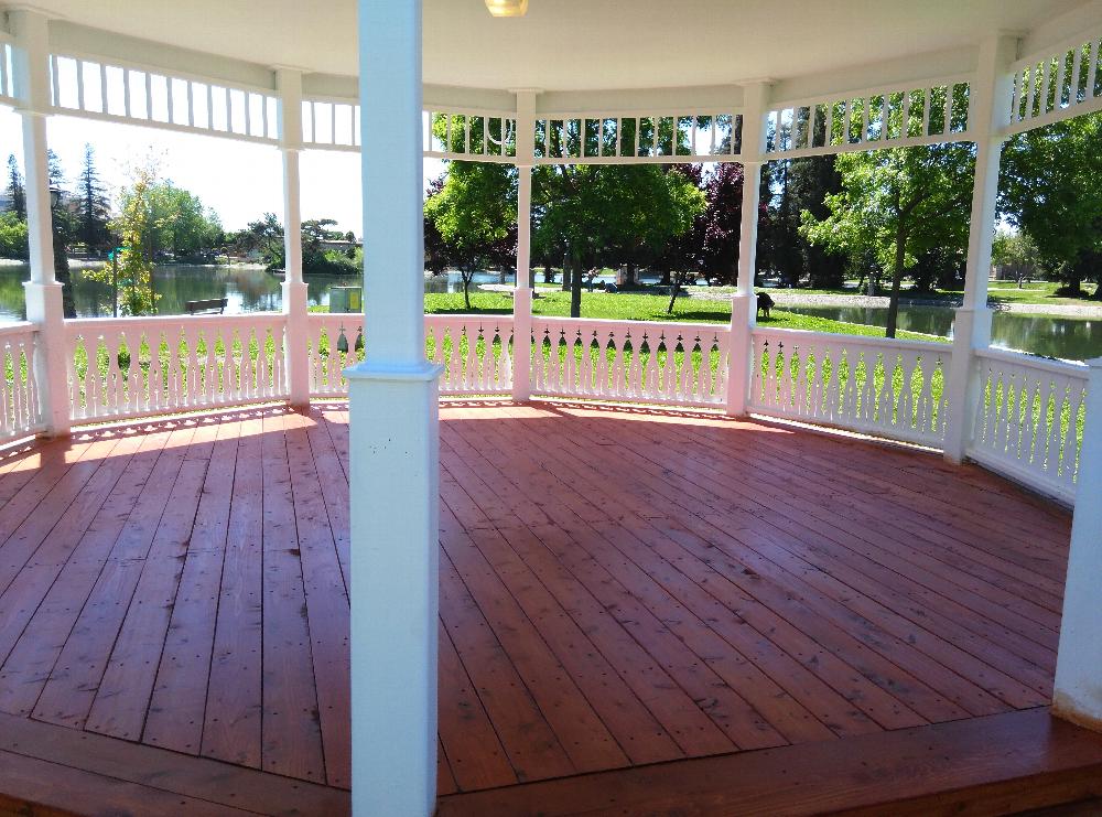 Clampers reflooring the gazebo at Ellis Lake.