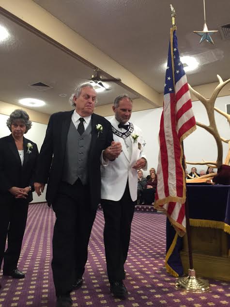 Phil Duval, Treasurer, being escorted by Grand Esquire Jack Marden during installation ceremony.
- April 2016