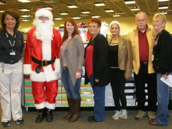 Shoe Party 12/17/12. Kathy Hall Mgr. Shoe Carnival, Santa, Angel Blackwell, Gina Rutherford, Donna Wolters, Walt Holland and Fran Chandler.