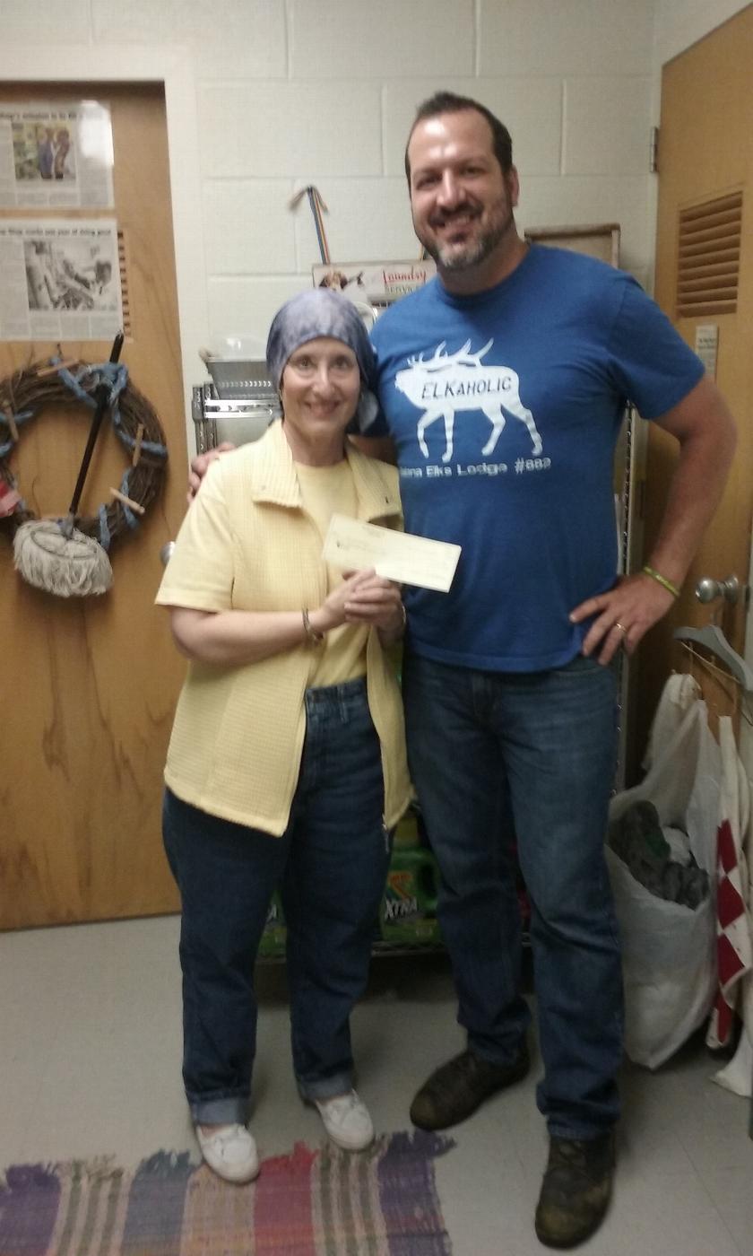  ENF Grant Coordinator Brian Kelly presents a $500 donation check to Missy Dalgarn, Director of The Mop Shop in Elizabeth, IL. The Mop Shop provides free cleaning supplies to those in need throughout Jo Daviess County. The donation was made possible from the funds provided by the Gratitude Grant awarded to the Lodge through the Elks National Foundation Community Investments Program. Our members are honored to support such a dedicated organization.