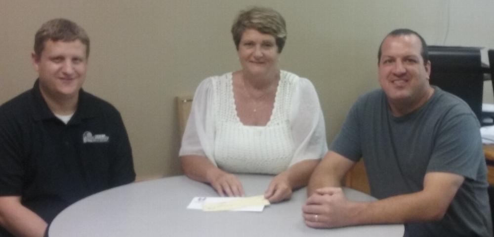 Exalted Ruler Doug Laity and ENF Grant Coordinator Brian Kelly present a $500 check to Lynn Berning, Executive Director, of The Workshop in Galena. The Workshop promotes the general welfare of individuals with disabilities in Jo Daviess County by providing vocational, support, and transit services to their consumers. The funds will help finance the improvement of the break room at The Workshop. The donation was made possible from the Gratitude Grant awarded through the Elks National Foundation. Our members are honored to support such a wonderful organization.  Elks Care. Elks Share.