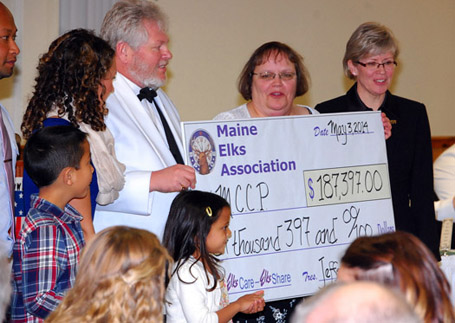 The "Big Check", representing the MEA's annual support of the Maine Children's Cancer Program, is the highlight for many at our May annual state convention.