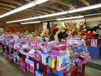 Maine State motorcyclists are on their 30th year collecting toys for needy in-state children.
Billed as the largest such event of it's kind in the world, the toys are distributed to Maine's 16 counties, and tribal residents.  The Sagadahoc county bikers have designated the Bath-Brunswick Elks' "Santa Claus Fund" as the recipient of our portion.