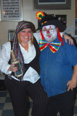 Members Lorna (Mrs Capt Morgan) and "Papa' Jack clown around at the lodge Halloween party.