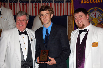 May 2012: ER Nick MacNeil, and MEA outgoing State President Wayne Cotterly, present a state scholarship to Bath winner Max Rawson, during the 2012 State Convention