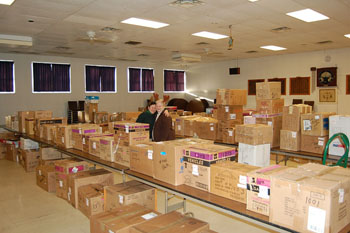 Member Lyni McCreary, and volunteer Helen, distributed 112 boxes to Bath area needy families.  Each box contains roughly $110 in clothes, games and toys per child in needy area families.
This is a part of a bigger effort, coordinated between the Bath and neighboring Brunswick Lodges, and is staffed by retired Elks, Emblems, and other volunteers.  The "Santa Clause Fund" packed and distributed toys to over 600 children overall during their two weeks in 2009.