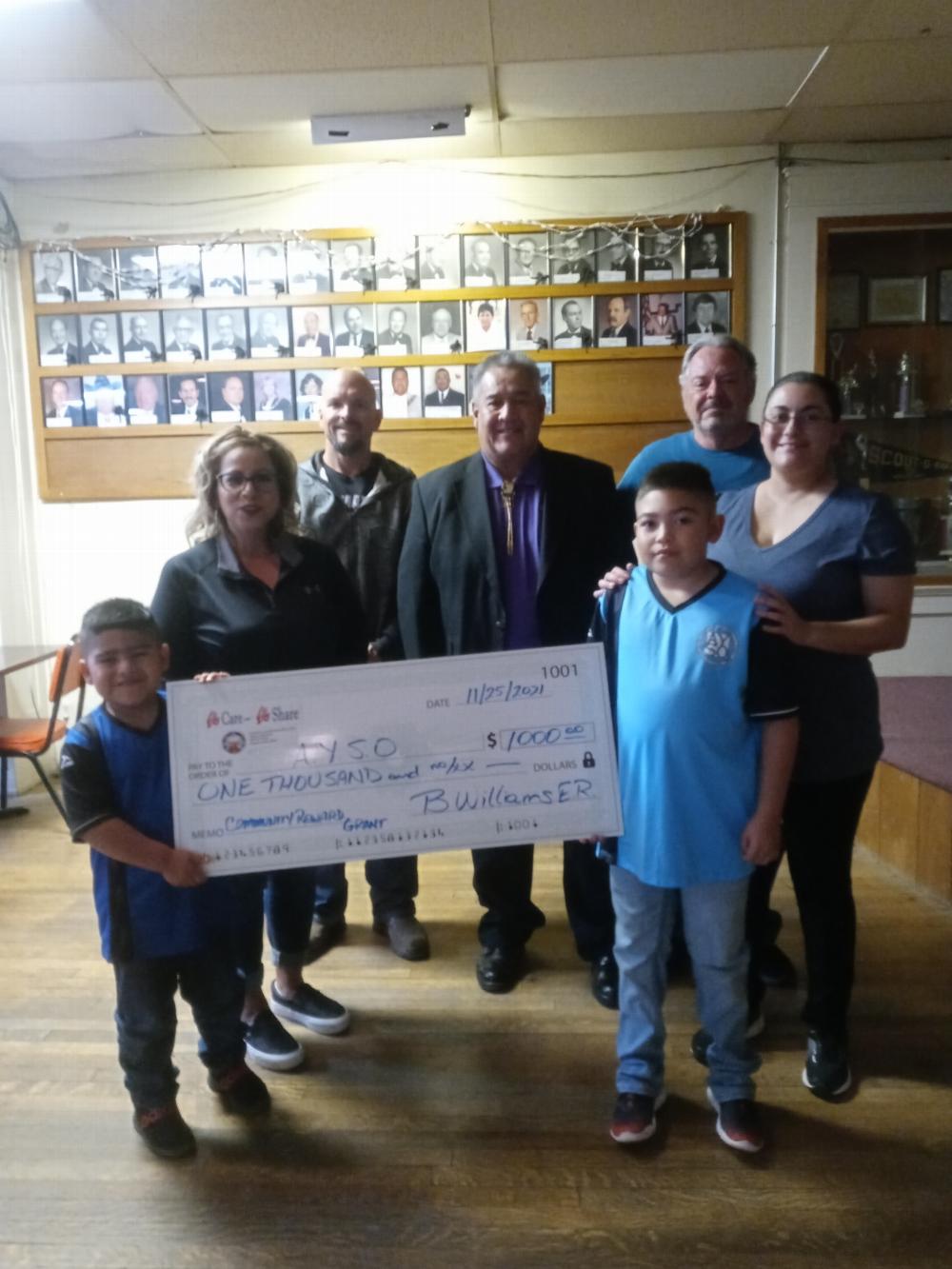 Community Reward Grant for $1000 presented to Douglas AYSO.