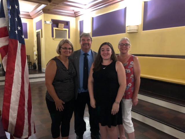 Newly initiated members Lori Jerauld, Sara Wieckhorst and Rhonda Bronakowski with Exalted Ruler Steve Gregory