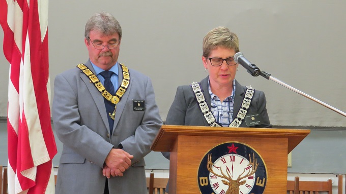 ER Steve Gregory and Chaplain Karen Vinti during the Opening Prayer