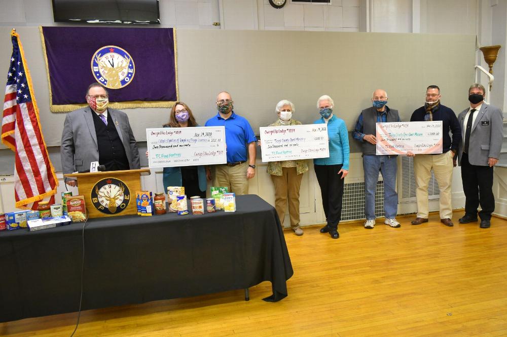 The Charities Committee of the Owego Elks Lodge 1039 today donated $6,000.00 to local food pantries.  Tioga County Open Door Mission, Catholic Charities of Thompson/Tioga Co and Tioga Rural Ministry each received a check for $2000.00
<br><br>
Left to Right.  PER Tim Sayers, Charities committee chair, Anita Martin, Charities committee, Patrick Aquilio, Catholic Charities of Tioga County, Barb Kotasek, Charities Committee, Sister Mary O’Brien, Tioga County Rural Ministry, PER Vern Singleton, Dustin Root, Tioga County Open Door Mission, Steve Gregory E.R.
