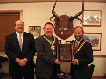 2006 D.D. Mark and Esquire Keith present P.E.R Dr. Mark Christensen and the Bemidji Elks Lodge with the 100 year plaque.