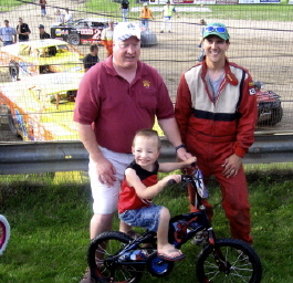 Candace West was able to have two bikes donated to give away at the Bemidji Speedway for Drug Awareness night. Pictured above are E.R. Ken Traxler, Driver Chad Wolff (who worked with the Elks) and bike winner Tyler Swann.