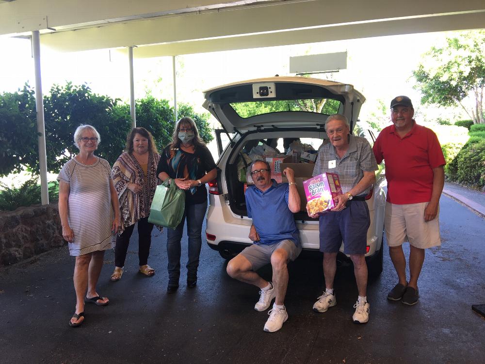 Trustee Mary Payne, Public Relations Chairman Tonya Wright, Shingletown Emergency Food Bank's Kelly Bullan, Leasing Knight Dave Wright, Secretary Rod Sullivan and Treasurer Mike Payne during our Food Drive 2020