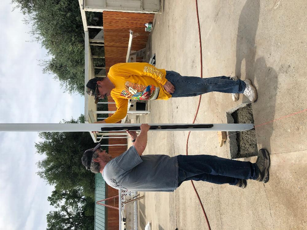 Gary Stucki & Dave Wright building new poolside shade structures