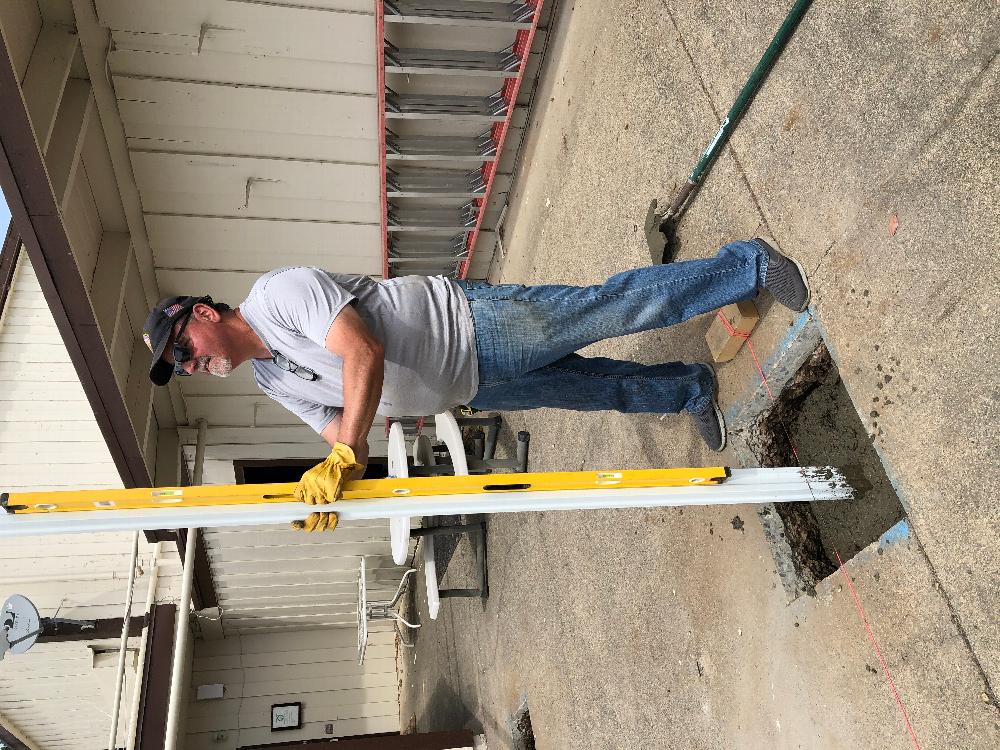 "Wrecking Crew" Mike Payne building new poolside shade structures