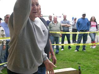 PER Jack Kinlin throws a shoe at the dedication of Horseshoe Pit's