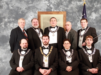 2010 Ritual Team: Front Row Esquire PER Jesse Clark, Exalted Ruler Chris Runnels, Loyal Knight PER Donna Baccelli, Lecturing Knight Collin Runnels.  Back Row: Candidate Tony Olson, Chaplain PER Greg Reddell, Inner Guard PER Mike Swisher, Coach PDDGER Dale Reeder, Esquire PER Mark Runnels.