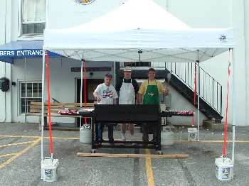 The Cooks await the crowd of 100 to come off the Busses and demand their food