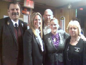 Mass Elks State President James Strojny, District Deputy Grand Exalted Ruler Denise Shurtleff of the South District along with Lodge Secretary Chris Larrivey and Exalted Ruler Laura Dickson welcome newly initiated member Lyndsay Larrivey.