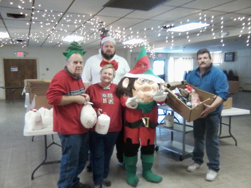 Members of the Franklin Elks Lodge filled over 100 Christmas baskets with food for local families in need. Pictured from left are member Robert Gillespie, State Representative and member Deborah Wheeler, ER Jeffrey Davis, member Mike Emerson, and DDGER/PER/Committee Chair Steve Bourdeau.