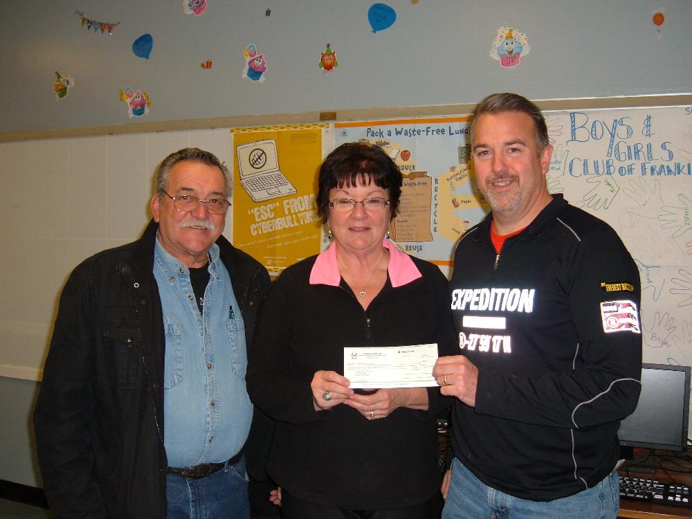George LaBonte and Kaye Collins present a check for $345.75 to the Franklin Boys and Girls Club to be used for XMAS gifts for the kids at the club.  The fund raiser was the second annual flea market event held at the Elk's Property in Franklin August 16, 2014.  The kids XMAS party was held 12/13/14, all the kids received what they were wishing for, George and Nancy LaBonte both attended the XMAS Party.  We look forward to another successful flea market next year.  Pictured from left are PER/PDD George Labonte, Leading Knight Kay Collins, and Director of the Boys & Girls Club, Tom Charbono.