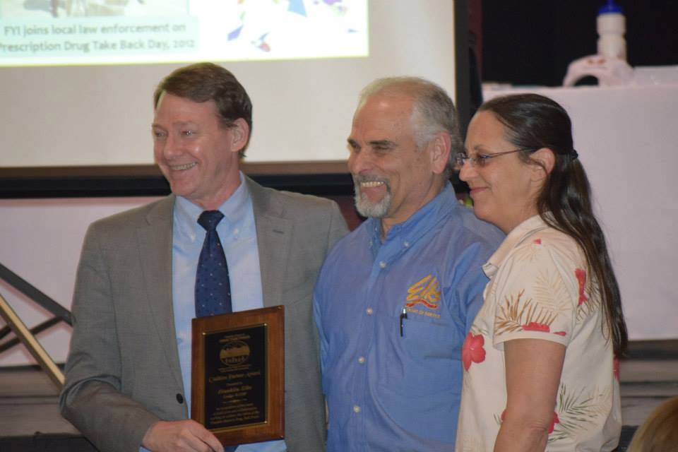 Mayor Ken Merrifield presents a plaque honoring the Franklin Lodge Of Elks 1280 efforts to curb substance abuse in Franklin to Elk's members Joe Guinta and Kim Maynard on March 12th at the Annual Celebration for the Mayor's Drug Task Force.
