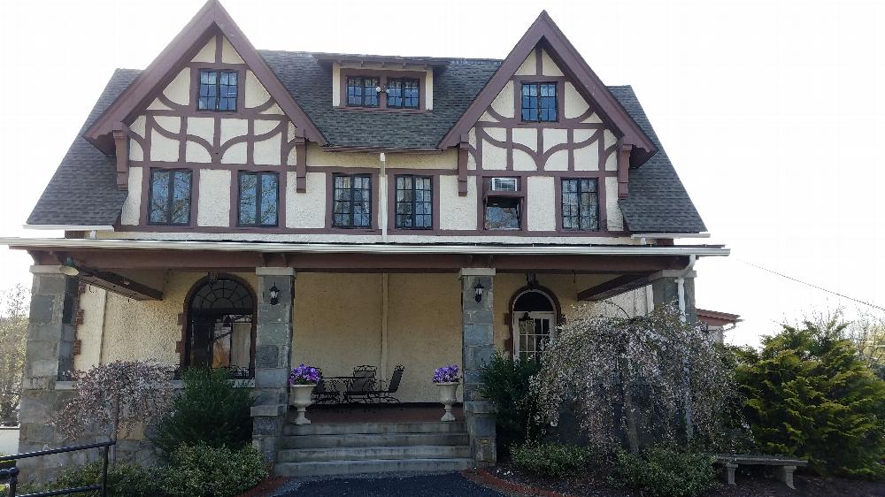 Side view of the lodge; additional entrance to Victorian Room.