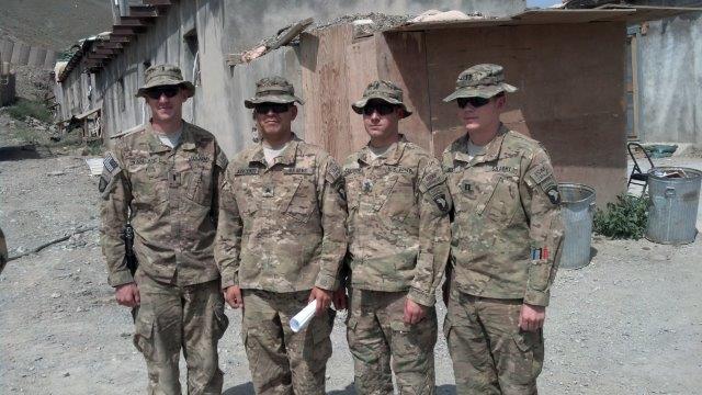 <center>Sgt. Alex Arredondo in Afghanistan with three other officers is a Medic with the 101st Airborne, 2014.