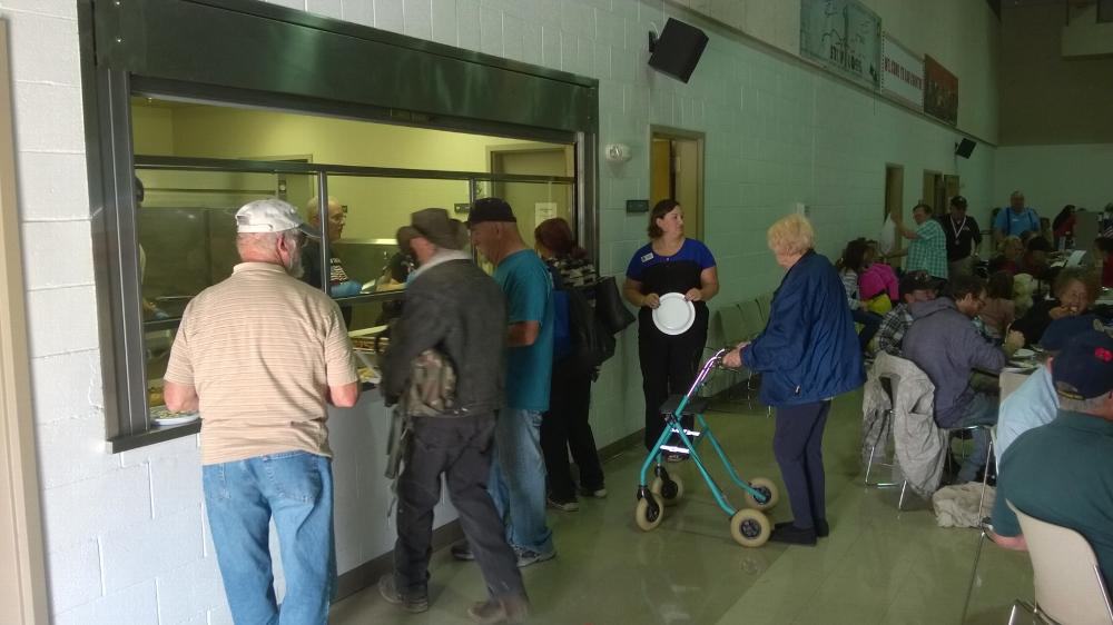 Veterans receiving their free breakfast provided by Bend Elks Lodge.  Biscuits & Gravy, Pancakes, Bacon, Sausage, Eggs, OJ & Coffee.