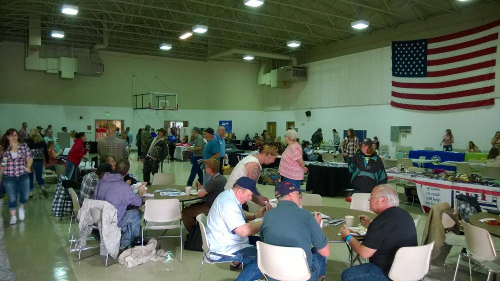 Veterans enjoying breakfast and visiting service providers at Bend Veteran Stand Down.  Bend Elks Lodge #1371 provided breakfast and sack lunches.