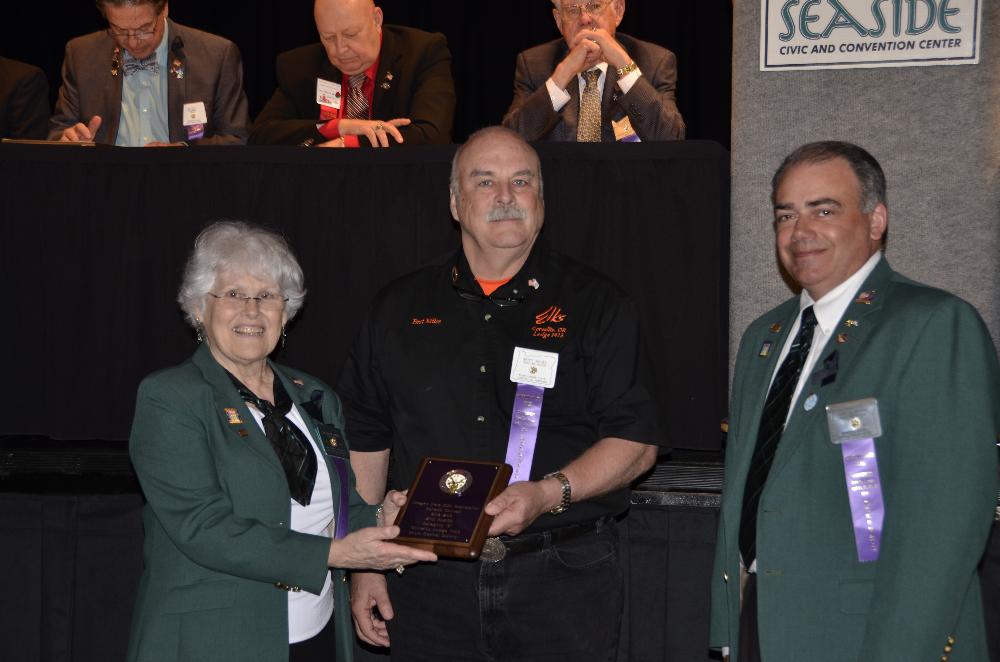 PER Bret Miles accepts an award at the 2013 State Convention in Seaside Oregon.