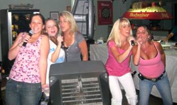 The girls singing Karaoke