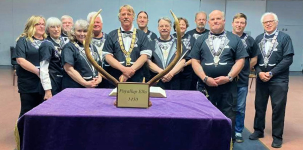 2022 Officers. From Left: Tiler Melissa Bellinger, Trustee Diana Mears, Treasurer George Jaquish, Loyal Knight Pam Fuller, Trustee Keith Rybacki, Exalted Ruler Steve Scholz, Trustee Derek Lucas, Squire Randy Powell, Secretary Jessie Finley, Inner Guard Jeff Ridley, Leading Knight John Anderson, Lecturing Knight Jeremie Nielsen, and Chaplain Ron Gagne. 