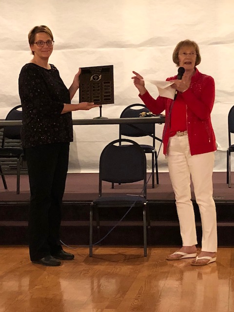 First Lady Theresa Southwick (L) is recognized as LOE Member of the Year for 2019.  Presenting the award is outgoing President, Kathy Laird (R)