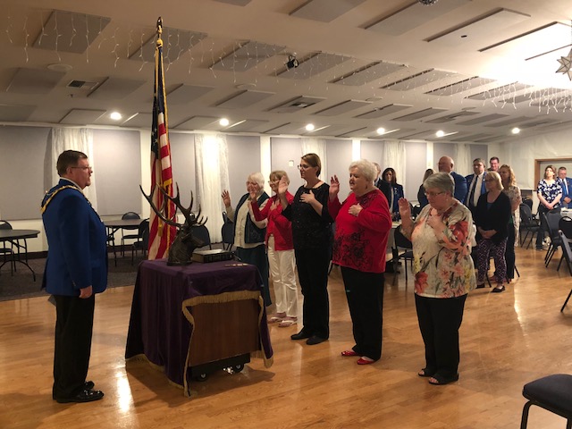 Exalted Ruler Dave Southwick administers the oath of office to incoming Ladies Of Elks officers for the 2019-21 biennium.