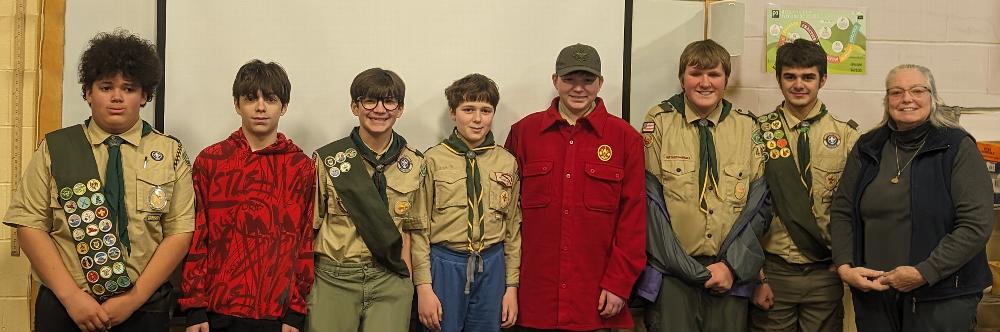 BSA Troop #405, happy to receive donation to help them all go to camp.