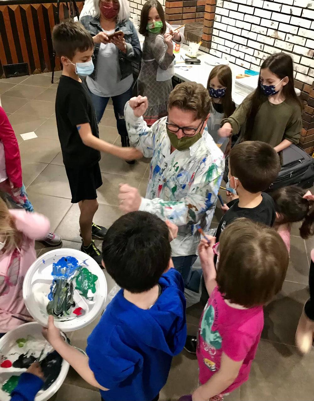 April 2021 - ER Anton Zeman getting painted during kids paint event.