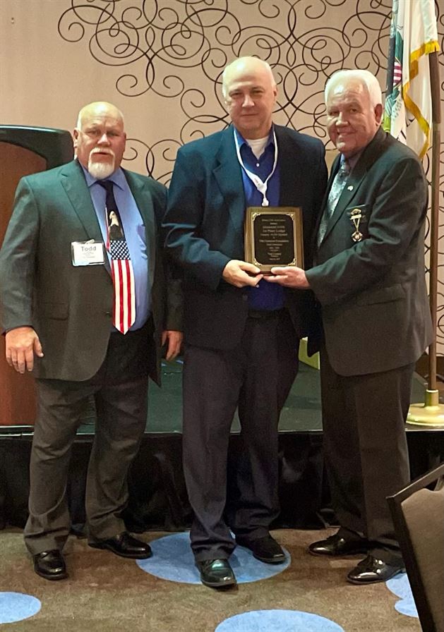 Exalted Ruler Ed Rentka accepting ENF award on behalf of Brookfield Elks Lodge for donation by member John Markee of over 2 million dollars.