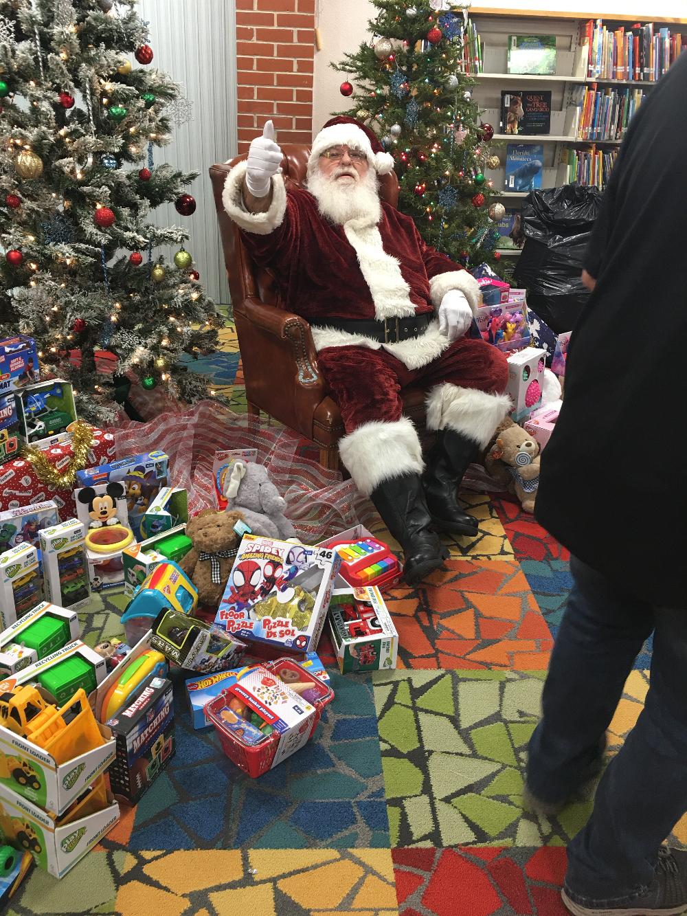 Leading Knight, Richard Leskovsky (Santa) presented Elks Lodge 1525 Christmas Gifts to San Jose Elementary School children.