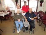 Sebring Elks 1529 hosted a Veterans Christmas Luncheon on Thursday, December 20, 2012. The event was attended by 30 Veterans from six of the local Veterans Homes. After a delicious meal Santa passed out presents to everyone. Pictured are Chairpersons Bert and Evelyn Marple along with Veterans Herb Richardson and Raymond Hernandez of Crowne Pointe. God Bless our Veterans