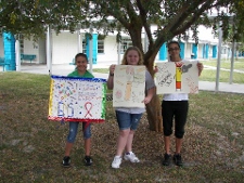 Sebring Elks 1529 recently held a Drug Awareness Poster Contest at the Hill-Gustat Middle School. Pictured are the three winners, Jada Amarasa, Makala Stamboni and Gabriella Rossy and their winning posters.