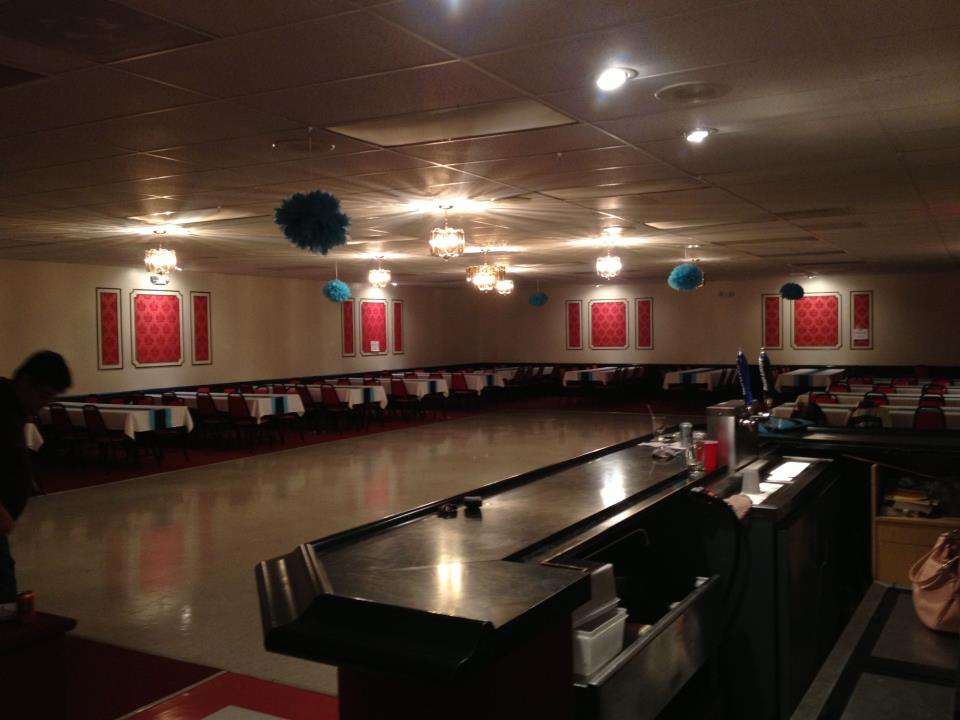 The grand Ballroom.  Seats up to 150 with all tables out.  Full bar and stage.  