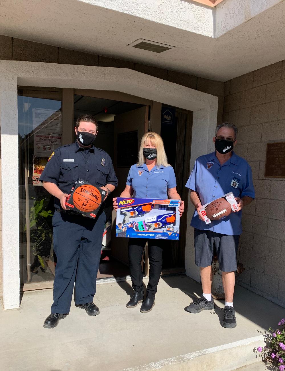 Michelle Solvin, PER and Jim Miller, GL Public Relations deliver toys to Indio Fire Dept for Toys for Tots December 22, 2020.