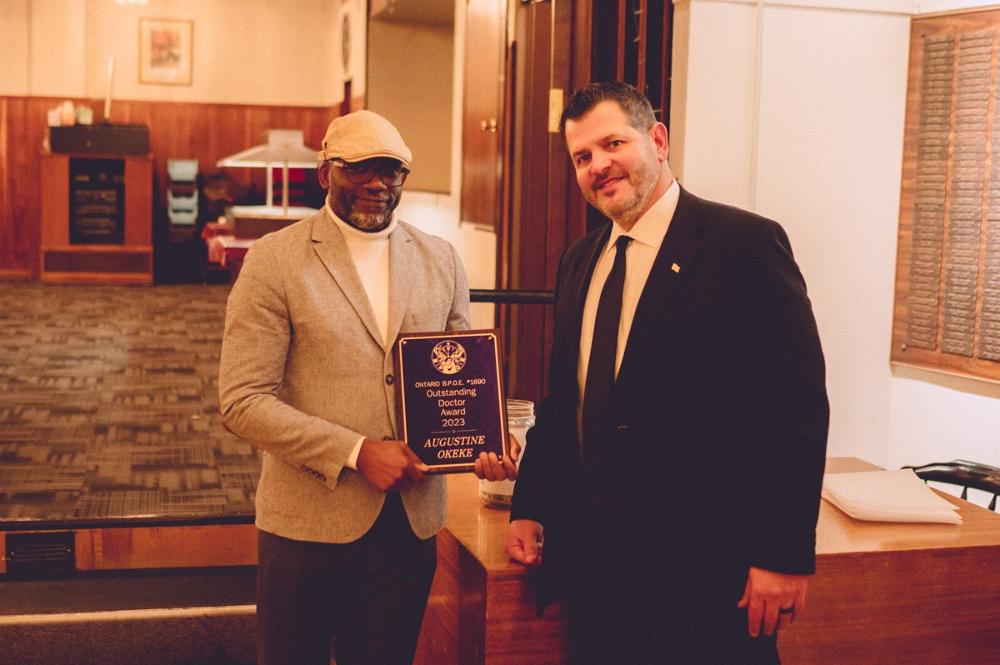 Dr of the year Augustus Okeke & ER Russ White 2023 Community Service Awards Banquet