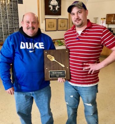Our Cook, Jake presents Dave Gerace with a personal award for his efforts in and around our kitchen for 2017 - 2018.